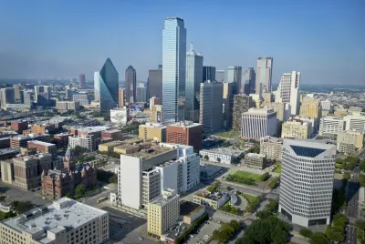 Luxury Dallas Arts District limestone architecture and evening reflection pool